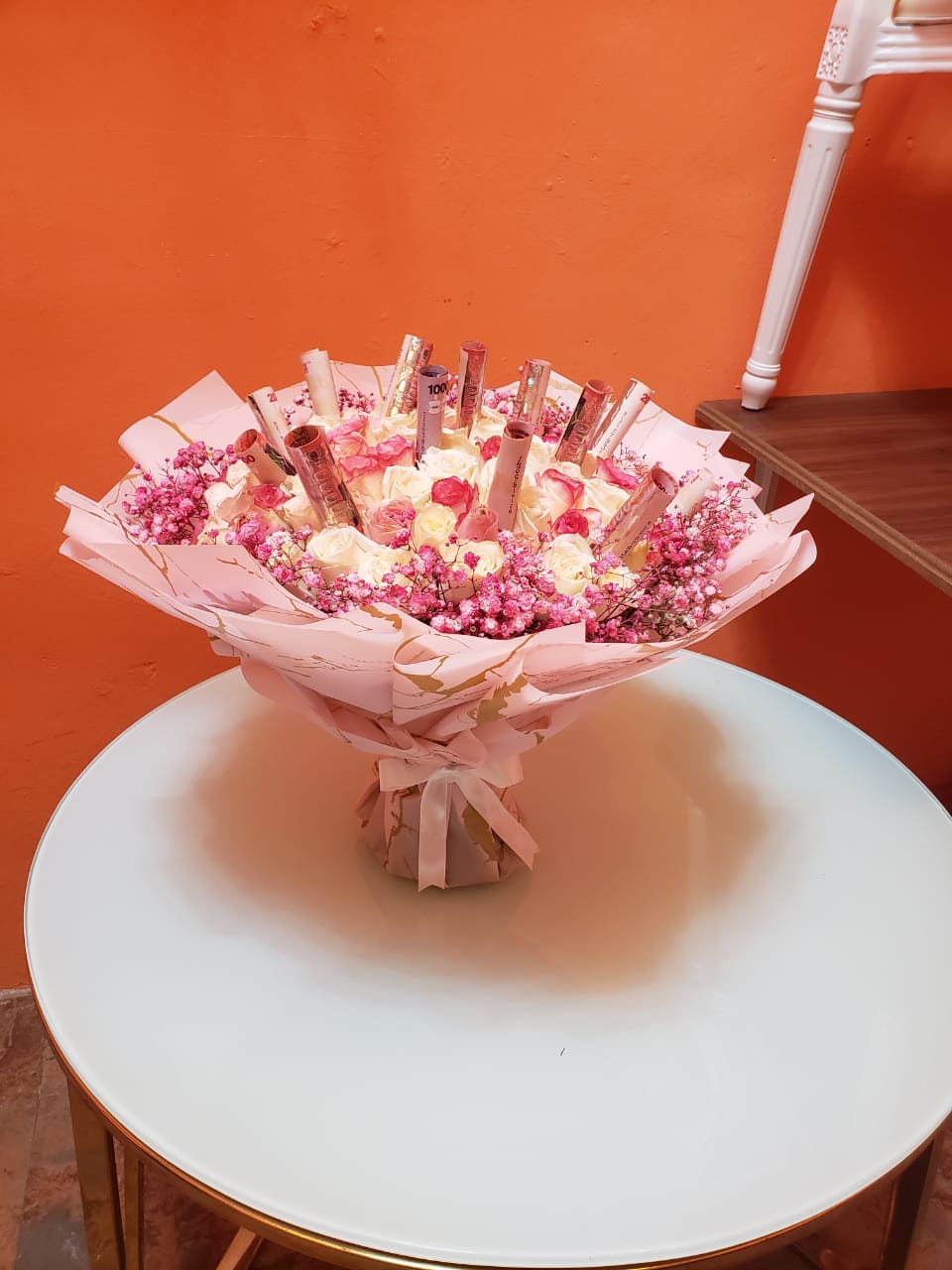 Birthday flower and gift arrangement